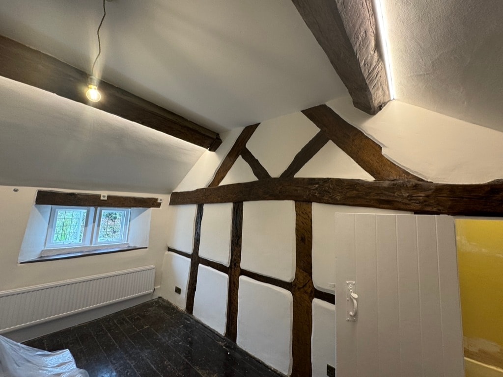 Modern interior stairwell with exposed beams — decorating project